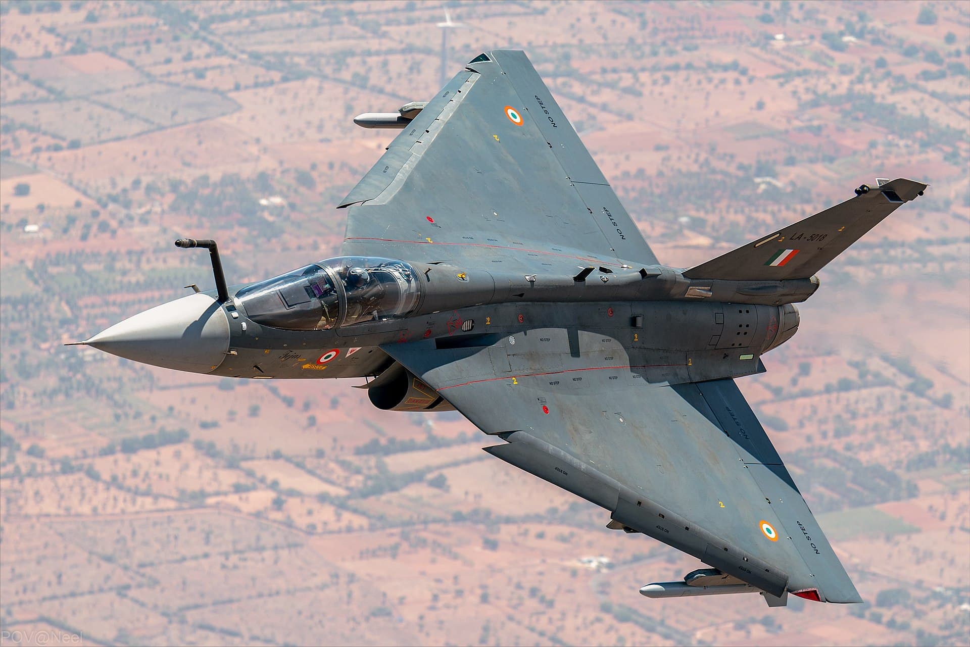 HAL Tejas fighter jet banking in flight